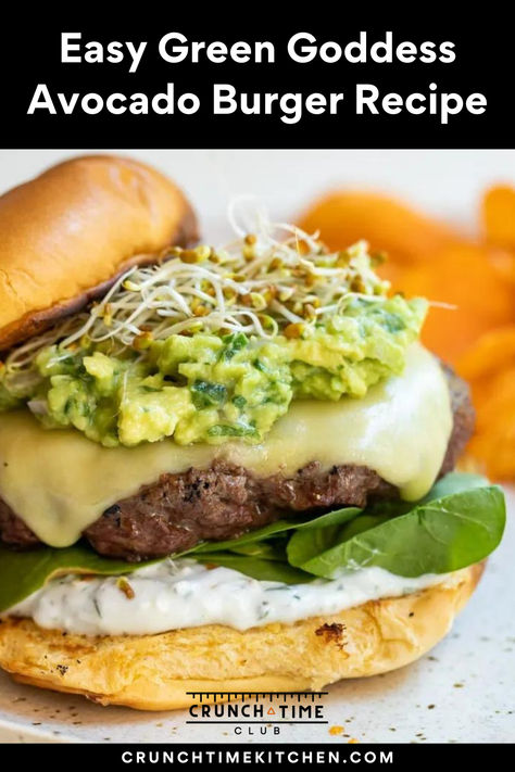 Green Goddess Burger. The ultimate burger recipe for summer! Think of a juicy burger patty topped with guacamole, sprouts, greens, and a homemade herb yogurt sauce. This avocado burger is perfect for BBQs. The easiest make-ahead homemade ground beef patties and delicious green toppings with a creamy sauce. #Hamburgers #GreenGoddess #Avocado Olive Burger Recipe, Herb Yogurt Sauce, Hamburger Recipes Easy, Homemade Ground Beef, Guacamole Burger, Ground Beef Patties, Avocado Burger, Burger Mix, Ultimate Burger