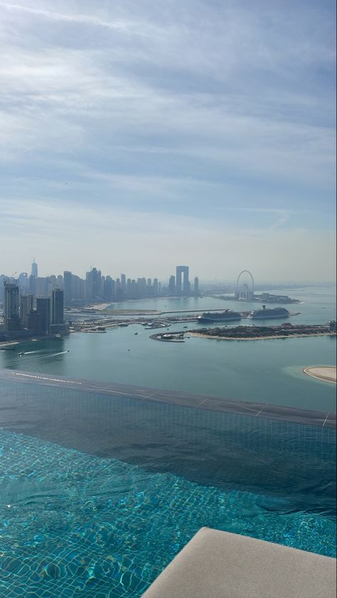 Pool views dubai view ferris wheel buildings dubai view views pretty blue light blue pool view dubai pool dubai sea beach views beach life ocean blue Sky Pool Dubai, Sky View Dubai, Light Blue Pool, Dubai Pool, Barbie Cars, Dubai View, Sky Pool, Aurora Sky, Los Angeles Airport