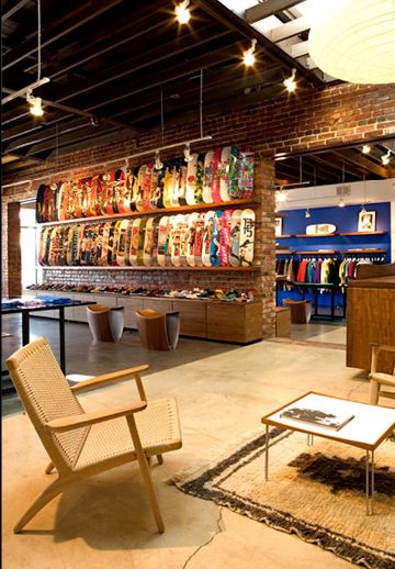 How the hell did they get a picture of my apartment? Skateboard Shop Aesthetic, Skateshop Interior, Skate Shop Design, Skateboard Display, Skateboard Room, Interior Construction, Build A Bike, Skate Store, Industrial District