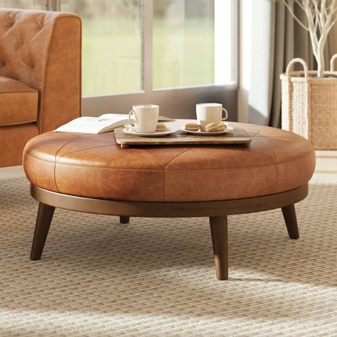 Showcase the Gio Ottoman in your living space for an exquisitely functional piece that is truly one of a kind. Large Round Ottoman Living Room, Pouf In Living Room, Round Ottoman Living Room, Large Round Ottoman, Round Leather Ottoman, Brown Ottoman, Leather Coffee Table, Leather Pouf Ottoman, Poly & Bark