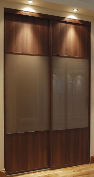 Sliding Wardrobe Doors — The Replacement Door Company Brown Sliding Wardrobe, Bedroom Almirah, Wardrobes With Sliding Doors, Glass Wardrobe Design, Brown Cupboards, Sliding Wardrobe Design, Chettinad House, Color Wardrobe, Sliding Door Wardrobe Designs