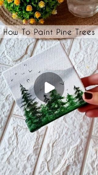 Navdeep on Instagram: "Easy Tutorial to Paint Pine Trees 🎨💫✨  Canvas Size 4*4 inches streched Canvas Acrylic Paints @kokuyo.camlin  #paintwithme #painting🎨 #arttherapy #paintingtutorial #easypainting  #acrylicpainting #minicanvaspainting #acrylicpaintingtechniques  #paintingreels #reels" Beginner Winter Painting, Easy Fairy Paintings For Beginners, How To Paint Pine Trees Easy, Tree Painting Tutorial Acrylic, Painting Pine Trees Acrylic Tutorial, Pine Tree Painting Tutorials, Canvas Painting Christmas Ideas, How To Paint Acrylic On Canvas, How To Paint A Tree Acrylic