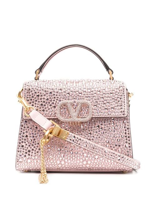 gem-embellished VSLING mini bag from VALENTINO GARAVANI featuring pink, leather, gemstone detailing, maxi VLogo Signature, single rounded top handle, adjustable detachable shoulder strap, gold-tone hardware, front flap closure, main compartment, internal slip pocket and internal logo patch. Valentino Garavani Bag, Hot Bags, Fancy Bags, Stacked Jewelry, Valentino Bags, Mini Handbags, Pink Mini, Pink Leather, Leather Mini