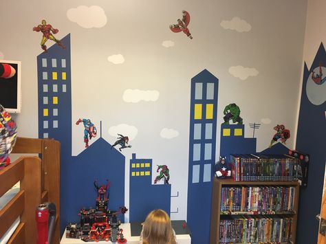 A lot of tape and paint later! Son loves it! Superhero Mural, Boys Bedroom Ideas Superhero, Boys Superhero Bedroom, Cityscape Mural, Avengers Room, Spiderman Room, Batman Room