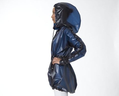 Terra's Stylish Raincoats Make Biking in the Rain Look Oh So Chic : TreeHugger Biking In The Rain, Free People Spring, Stylish Raincoats, Packable Rain Jacket, Spring Showers, Vinyl Raincoat, Spring Shower, Free People Jacket, Raincoats For Women