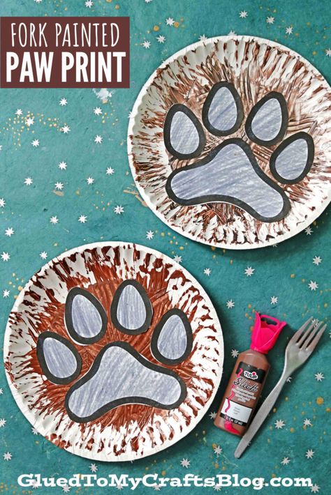 Fork Painted Paw Print Craft For Kids To Recreate - Glued To My Crafts Paw Print Name Craft Preschool, Puppy Art Projects For Kids, Pet Art For Toddlers, Dog Crafts Preschool, Pet Crafts For Toddlers, Pets Craft, Dog Themed Crafts, Paw Print Crafts, Paw Crafts