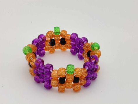 Halloween Jack-o-lantern Kandi Bracelet Halloween Kandi Cuff, Kandi Pumpkin, Halloween Bead Bracelet, Halloween Kandi Ideas, Halloween Kandi Bracelets, Kandi Halloween, Kandi Bracelets Patterns, Kandi Bracelets Ideas, Kandi Core