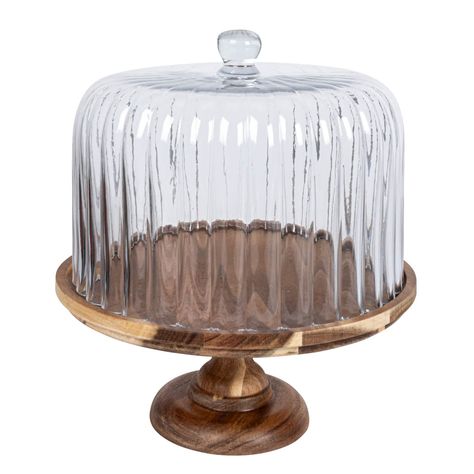 "Shop the Hello Honey 12\" Acacia Wood Pedestal with Fluted Glass Cloche at Michaels. com. Use this pedestal to showcase and serve delicious baked goods, and artisanal cheeses, ideal for special occasions, dinner parties, or as charming display pieces in the kitchen or dining area. Elegant and rustic, this set includes a 12\" round acacia wood base and a fluted glass cloche. Perfect for a farmhouse or rustic-inspired home décor, this pedestal adds a touch of natural beauty to any setting. Use th Wood Cake Stand, Cake Dome, Wood Cake, Fluted Glass, Ceramic Stoneware, Artisan Cheese, Wood Pedestal, Glass Cloche, Cake Display