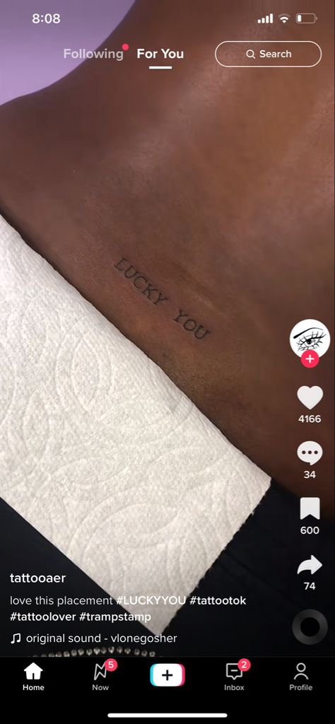 The Word Lucky Tattoo, Lucky You Back Tattoo, Rare Tramp Stamp, Lucky You Tattoo Tramp Stamp, Lucky You Tramp Stamp, Tramp Stamp Name Tattoos, Lucky Tattoo Word, Watch Me Tattoo, Word Tramp Stamp Tattoos