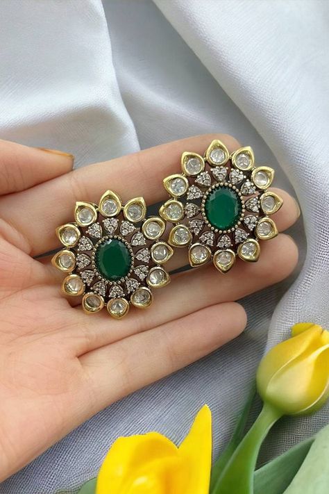 Sabyasachi-inspired Emerald Polki Earrings. Crafted with uncut Polki gems and intricate Jadau Kundan work, these earrings exude timeless elegance. The mesmerizing green doublets evoke a sense of regal charm, while the fusion of tradition and luxury makes them perfect for any occasion. Elevate your style with these exquisite earrings, a true reflection of opulence and grace. *𝐏𝐑𝐎𝐃𝐔𝐂𝐓 𝐃𝐄𝐓𝐀𝐈𝐋* * Material: Brass * Plating: Gold Plated * Stone: Semi Precious Kundan & Polki. *𝐃𝐈𝐌𝐄𝐍𝐒 Sabyasachi Earrings, Kundan Studs, Sabyasachi Jewelry, Big Statement Earrings, Kundan Work, Sabyasachi Jewellery, Fancy Jewelry Necklace, Polki Earrings, Chandbali Earrings