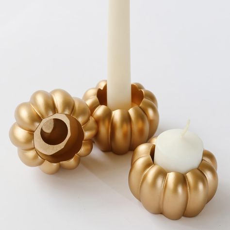 PRICES MAY VARY. Beautiful & Functional - Our new Pumpkin Shaped 2 in 1 Tealight/Candlestick Holder (Set of 6) feature vertical ribbed pumpkin outline detail and a multifunctional design. The pumpkin candle holder has an opening that can hold a standard tea light, pillar candle, or candlestick. Whether they are a gift or dining room table decorations they are sure to illuminate your night. HOME DECOR/SHELF DECOR - These rustic Pumpkin candle holders are perfect for all Autumn & Fall events or ju 6 Dining Table, Pumpkin Candlesticks, Tea Lights Centerpieces, Pumpkin Outline, Gold Pumpkin, Pumpkin Candle Holder, Unique Table Settings, Gold Pumpkins, Rustic Pumpkin