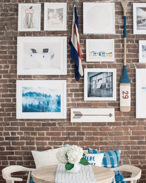 how-to-hang-a-gallery-wall-on-exposed-brick-walls-1 Stairway Wall Decor, Pictures On Wall, Diy Large Wall Art, Large Scale Wall Art, Hang Pictures, Foyer Decorating, Exposed Brick Walls, How To Hang, Gallery Wall Decor