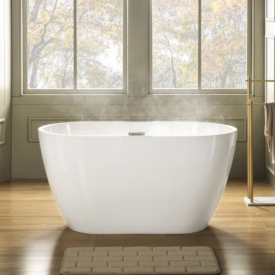 The double-ended freestanding tub maximizes comfort while emphasizing convenience. Not only is the stain-resistant tub easy to climb into, but it is also a breeze to clean. This tub will tolerate regular use and remain a successful part of your master bath or guest suite. Color: Brushed Nickel | WoodBridge 48" X 26" Freestanding Soaking Acrylic Bathtub Acrylic in Gray, Size 24.0 H x 48.0 W in | Wayfair Small Freestanding Tub, Small Bathtub, White Tub, Dream Bath, Freestanding Tub, Acrylic Bathtub, Soaking Bathtubs, Free Standing Bath, Soaking Tub