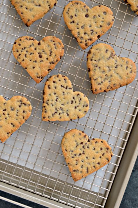 Heart Shaped Chocolate Chip Cookies Recipe - About a Mom Heart Shaped Chocolate Chip Cookies, Shaped Chocolate Chip Cookies, Heart Shape Chocolate, Rocky Road Cookies, Fiesta Chicken, Peanut Butter Eggs, Heart Shaped Chocolate, Chocolate Chip Cookies Recipe, Heart Cookies