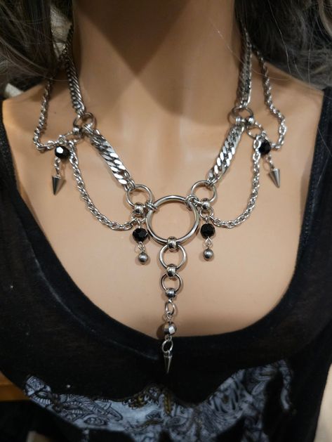 Handmade Chunky Stainless Steel Chunky Chain Gothic Edwardian style Choker Layered Necklace Set, a stunning piece of alternative punk fashion that will elevate any outfit with its bold and edgy look. This necklace features  strands of different chain styles and spikes, and it can be worn at various lengths due to the built-in extender. It runs from approximately 15 inches to 18 inches. it is all stainless steel so it is completely waterproof and will NEVER tarnish. The layered design of this necklace set makes it a versatile accessory that can be worn with a variety of outfits, from casual jeans and t-shirts to formal dresses and evening wear. Its adjustable length allows it to be worn as a choker or a longer necklace, depending on your preference.   Makes a great gift for the special woma Chunky Necklace Outfit, Victorian Dark Academia, Goth Collar, Punk Mode, Victorian Gothic Jewelry, Festoon Necklace, Necklace Aesthetic, Mode Punk, Necklace Outfit