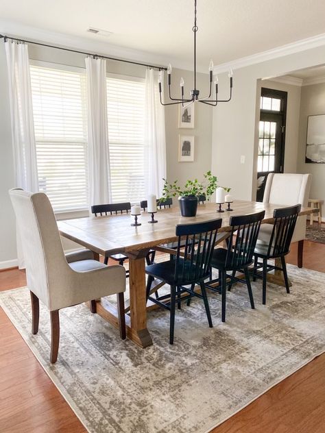 Dining Room With Brown Floors, Dining Room Agreeable Gray, Agreeable Grey Dining Room, Agreeable Gray Sherwin Williams Dining Room, Grey Kitchen And Living Room Combo, Modern Farmhouse Grey Walls, Dining Room With Wood Floors, Cozy Dinning Room Decor, Dining Table Different Head Chairs