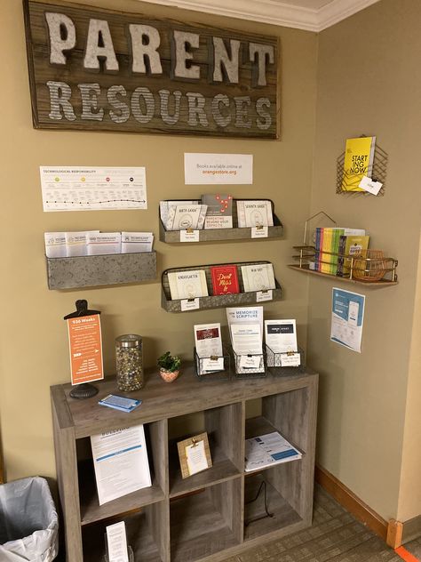 Parent Resource Room Schools Ideas, Daycare Center Room Ideas, Front Office Decor Reception Areas For School, Daycare Front Office Ideas, Ministry Office Design, Pastoral Office Ideas, Childcare Lobby Ideas, Church Welcome Tables, High School Office Bulletin Board Ideas