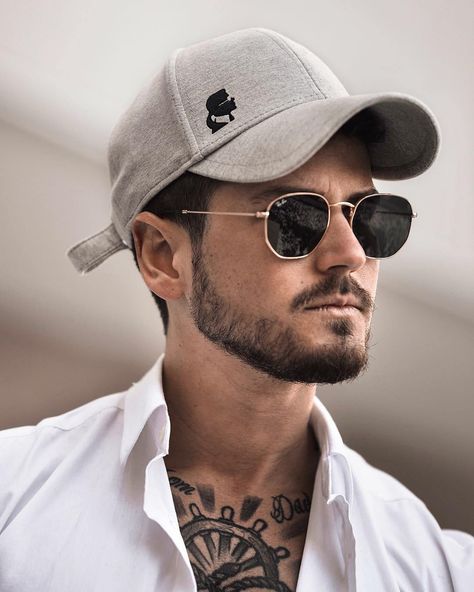 White shirt,beige cap and Aviators frames Cool Sunglasses For Men, Men’s Sunglasses, Carhartt Fits, Patchy Beard Styles, Rayban Sunglasses Mens, Beige Cap, Best Mens Sunglasses, Glasses Outfit, Patchy Beard