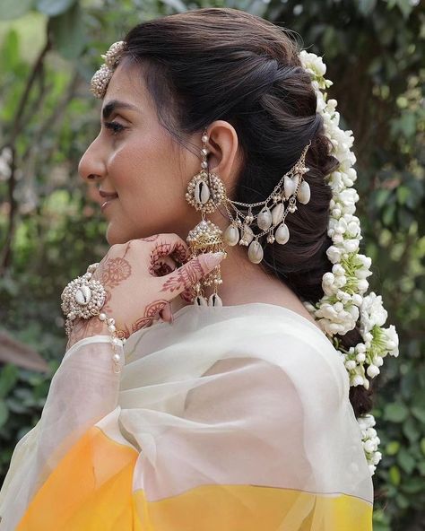 Shell Jewellery For Haldi - Mehendi- Baby shower Brides. 🌸 We customise the set completely according to your needs! 🌸 1) DM US YOUR OUTFIT PICTURE That you'll be wearing For The Ceremony 2) Directly Whatsapp Us On +918006377303. We deliver All Over India 🤗. NOSEPIN KAMARPATTA BAAJUBAND KALEERA etc Are Charged Extra. Customisation of Colours And designs Can be done. . Completely HandMade 💕🌼. . Minimum 10 Days prior Order Basis. . Shipping : 7-10 Working Days. . Contact Us : +918006377303. ... Shell Jewelry Ideas For Haldi, Shell Jwellery Haldi, Haldi Ceremony Jewellery For Bride, Shell Jewellery For Haldi, Haldi Jewellery For Bride, Kori Jewellery, Jewellery For Bride, Jewellery For Haldi, Mehndi Decoration