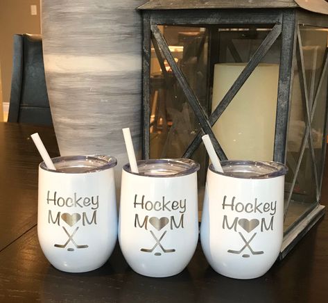 These colorful tumblers will make great gift for all. Great for your icy beverage or your hot drink. Hockey Mom engraved on this tumbler, a must for every hockey mom Great for a birthday, hockey tournament, Christmas gift.  What a great keepsake for anyone to have, their own hockey tumbler - 12 oz tumbler in your choice of color - 18/8 stainless Steel and with no BPA -Double wall vacuum insulated for hot and cold liquids -Clear plastic push on lid with opening for easy drinking  Care of tumbler To extend the life of your tumbler please hand wash,  *DO NOT PUT IN DISHWASHER* Hockey Mom Tumbler Cup, Coach Christmas Gifts, Hockey Diy, Hockey Crafts, Hockey Mom Gifts, Hockey Tournament, 12 Oz Tumbler, Hockey Tournaments, Mom Gift Basket