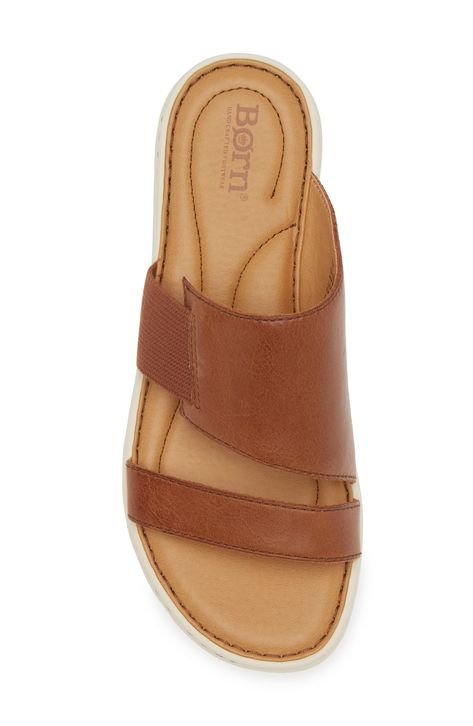 With a cushy insole, this casual slide sandal offers lasting comfort to be a weekend wardrobe favorite. Leather upper/textile lining/synthetic sole Imported Brown Synthetic Sport Sandals For Summer, Beach Slides With Ortholite Insole And Open Toe, Casual Slide Footbed Sandals With Ortholite Insole, Brown Slip-on Sport Sandals With Textured Footbed, Brown Slip-on Sport Sandals For Vacation, Brown Sport Sandals For Spring Beach Occasion, Casual Brown Flat Sport Sandals, Comfortable Brown Slide Sport Sandals, Cushioned Slip-on Synthetic Slides