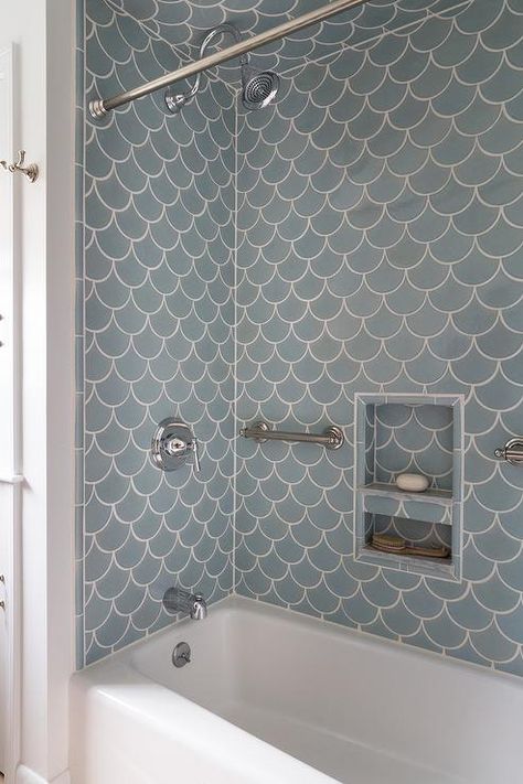 A drop-in bathtub is clad in blue fan tiles, Fireclay Ogee Drop Tiles, accented with a blue tiled shower niche is flanked by polished nickel towel holders. Ogee Drop Tile, Blue Marble Bathroom, Slate Bathroom Tile, Modern Shower Tile, Bathroom Niche, Modern Bathroom Design Ideas, Grey Bathroom Tiles, Modern Bathroom Tile, Missing Person