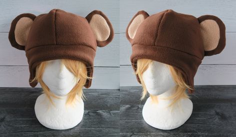 This Monkey hat is made from fleece. Multiple colors are available. If you don't see a color you want let me know and if you have a preference for inner ear color. ⫸ Perfect for: fans, cold weather, costumes, or conventions. Very warm! ⫸ Monkey with hair does not have free shipping⫸ Size: If in doubt order the larger size. Adult: 24-25 Inches Youth: 21-23 Inches Youth: 18-20 Inches ⫸ Care instructions: I recommend hand wash but should be fine in machine wash cold.⫸⫸Made when ordered.All hats are Random Things To Buy, Weird Hats, Weather Costumes, Monkey Costume, Stuff I Want, Fun Hats, Crochet Animal Hats, Monkey Hat, Silly Hats