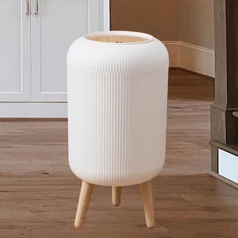 PRICES MAY VARY. Wood Grain Lid: The white bathroom trash can is designed with a special wood grain, using water transfer printing technology, making the wood grain look very realistic. White fresh appearance with wood grain lid, is the perfect decoration for your home! Prevent Odors And Pets: Garbage can with lid effectively reduce odor emission and take care of your home health. The removable liner design can place and hide the garbage bag, which is easy to replace the garbage. Modern & Stylis Nursery Trash Can, Bathroom Garbage Can Ideas, Trash Can For Bedroom, Cute Trash Can, Bathroom Trash Cans, Bathroom Garbage Can, Liner Design, Trash Can With Lid, Door Room