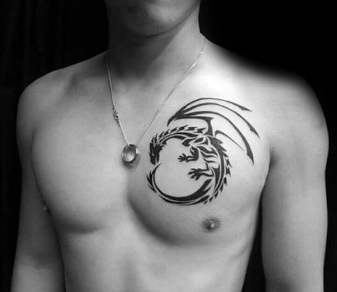 Upper Chest Guys Tribal Dragon Tattoos Tattoo Ideas For Men Small Chest, Tattoo On The Chest For Men, Upper Shoulder Tattoo Men Ideas Small, Pectoral Tattoo Men, Dragon Chest Tattoo Men, Men Tattoo Chest, Cool Chest Tattoos For Guys, Mens Chest Tattoos Ideas Design, Upper Chest Tattoo Men