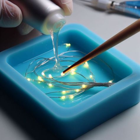 Do you want to add an intriguing and elegant touch to your art by embedding LEDs in resin but don't know where to begin? The following steps will guide you in turning your creative aspirations into reality, and crafting unique and impressive pieces. Let's explore how to embed LEDs in epoxy resin to create illuminating […] Resin Crafts With Lights, Epoxy Silicon Mold, Resin Lights Diy, Using Resin In Crafts, Diy Resin Molds Ideas, How To Make A Resin Mold, Creative Resin Ideas, How To Layer Resin, Epoxy Resin Lamp Diy