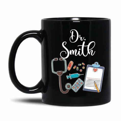 PRICES MAY VARY. [PERSONALIZED MUG GIFT]: Are you looking for an unique travel coffee mug gift for DOCTOR / NEW DOCTOR / FUTURE DOCTOR / MEDICAL STUDENT / PHD / COWORKER? This customized mug is the best choice to express your love. Everybody will enjoy taking sips of coffee, tea or any drinks from this mug. Awesome mug gift for Birthday / Thank You / Christmas / Thanksgiving / Retirements / Graduation. [HOW TO CUSTOMIZE]: Click “customize now” button, choose size then enter name. The design is p Graduation Doctor, Black Tea Cup, Doctor Stethoscope, Personalized Stethoscope, Mugs Designs, Doctor Graduation, Gift For Doctor, Medicine Student, Medical Gifts