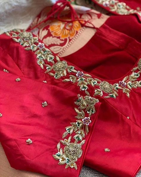 Elevate your traditional wardrobe with our stunning Red Zardosi Maggam Work Blouse. Featuring intricate zardosi embroidery, this blouse is a masterpiece of fine craftsmanship, combining bold red hues with luxurious detailing. The rich maggam work, adorned with metallic threads and beads, creates a regal look, perfect for weddings, festive occasions, or any grand celebration. Tailored from premium fabric, this blouse can be customized in both size and color, offering a personalized fit for ev... Simple Zardosi Work Designs, Simple Maggam Work Blouse, Simple Maggam Work, Zardosi Work Blouse, Traditional Wardrobe, Long Blouse Designs, Blouse Works, Blouse Designs High Neck, Zardosi Embroidery