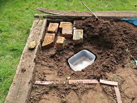 Homeowner buries a plastic container in her yard—look at her incredible backyard idea! Fairy Herb Garden, Pond Crafts, Backyard Sandbox, Waterfall Pond, Diy Solar Fountain, Easy Backyard Diy, Vegetable Beds, Diy Waterfall, Hometalk Diy