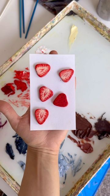 Amanda Eve on Instagram: "painting little strawberry pieces for my waffle board! in love with these 🥹🍓 - - - #oilpainting #paintingprocess #artistoninstagram #oilpaintingprocess #contemporarypainting #airdryclay #clayart #fruitart #strawberry" Strawberry Air Dry Clay, Strawberry Clay Art, Strawberry Ceramics, Painting On Random Things, Amanda Eve, Paint Strawberries, College Sketchbook, Waffle Board, Painted Strawberries