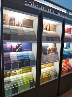 Paint Showroom Interiors, Paint Store Display Retail, Paint Showroom Display, Paint Store Design Interior, Paint Shop Interior Design, Paint Showroom, Paint Display, Wallpaper Display, Design Studio Workspace