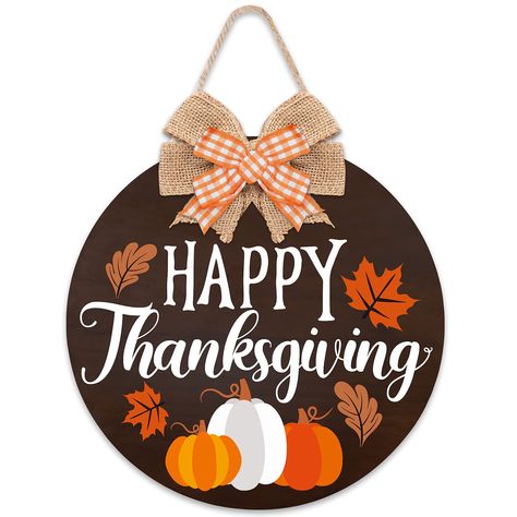 PRICES MAY VARY. Rustic Happy Thanksgiving Door Sign Decorations - The package includes 1 pcs round happy thanksgiving door sign with a rustic burlap & buffalo plaid bowknot (No DIY Required). You’ll be able to get an autumn vibe with this door hanger. Rustic Farmhouse Pumpkins & Maple Leaves Designs -Printed with orange pumpkins, maple leaves, and charming fonts. This farmhouse-style door hanger can be put with a wreath to greet your friends or guests from August to November. Made of Natural Wo Thanksgiving Round Wood Sign, Thanksgiving Door Hangers Wooden, Leaves Decoration Ideas, Thanksgiving Door Hangers, Thanksgiving Door Sign, Orange Buffalo Plaid, Halloween Boards, Door Classroom, Happy Thanksgiving Sign