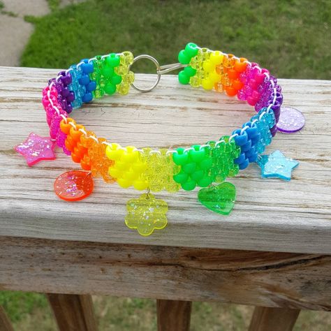 This kandi choker is made with rainbow pony beads and hand painted rainbow charms. Made to order in your size. Note charm shapes will vary depending on availability. Perfect for any event! You will get lots of compliments in this unique wearable art! Stand out at your next event! Edm festival  Raves Party  Rave outfit  Festival outfit Pride Birthday party Clowncore Accessories, Kandi Choker, Pride Birthday, Kawaii Choker, Kandi Necklace, Kandi Inspo, Rainbow Choker, Kawaii Necklace, Diy Kandi Bracelets