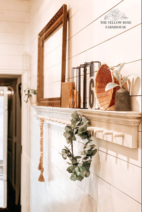 DIY Peg Rail with Shelf in farmhouse laundry room decorated with vintage books, antique frame, indoor plants and other farmhouse accents and decor | The Yellow Rose Farmhouse | www.theyellowrosefarmhouse.com Peg Rail Decor Ideas, Peg Rail Styling, Shelves With Hooks Decor, Peg Rail Shelf Bedroom, Mudroom Shelf Decor, Peg Rail Shelf Bathroom, Mantel Shelf Decorating Ideas, Diy Entryway Shelf, Peg Shelf Decor