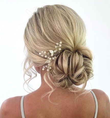 Ousled Low Updo Bun Inspiration Low Bun Updo Bridesmaid, Maid Of Honor Hairstyles Low Buns, Low Side Bun Bridesmaid Hair, Bridesmaid Hair Updo With Flowers, Bridesmaid Hair Low Updo, Wedding Hair Styles Low Bun, Low Bun Wedding Hair With Headpiece, Bridesmaids Low Bun, Bridesmaid Low Bun Hairstyles