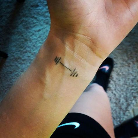 Get inspired to get a cool fitness tattoo to show off your motivation and passion. Have a permanent motivation to stay fit and healthy with one of these stylish workout tattoos. Barbell Tattoo, Bandana Rajut, Shape Tattoo, Small Tattoos With Meaning, Strength Tattoo, Inspiration Tattoos, Religious Tattoos, Tattoos Geometric, Tattoos Skull