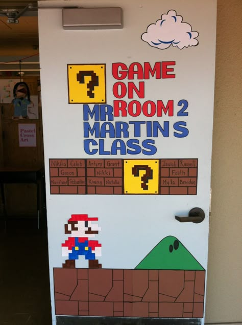 My classroom door, probably the thing I'm the most proud of this year. Super Mario Bros Classroom Door, Mario Kart Classroom Door, Video Game Classroom Door, Video Game Door Decorations, Mario Classroom Door, Super Mario Classroom Door, Video Game Theme Classroom, Video Game Classroom, Mario Classroom