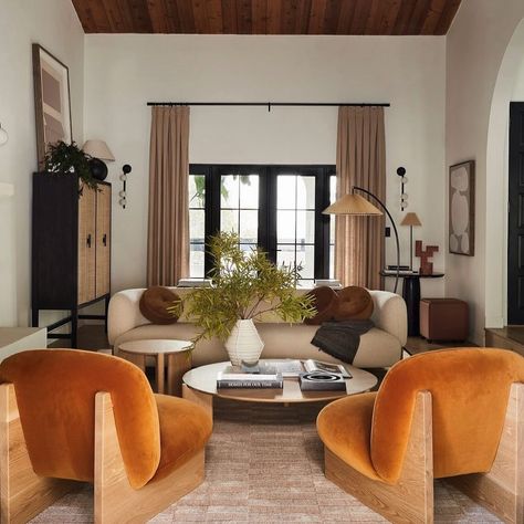 Earth tones with a POP of velvet orange loveliness 🍊Would you go bold and add a pop of color or stick to neutrals??? . . . . . . . . . By: @bobby @akindofhome @tramp.studio #interiordesigner #interiordesign #californiainteriordesigner #socaldesigner #sandiego #sandiegohomes #coastaldesigners #localcontractors #homediyinspo #homedecorinspo #interiorstylists #springhomedecor Neutral Interiors With Pops Of Color, Neutral Interior With Pops Of Color, Neutral Home Decor With Pops Of Color, Neutral Home With Pops Of Color, Neutral With Pop Of Color Living Room, Neutral Interior Design, San Diego Houses, Neutral Interiors, Spring Home Decor