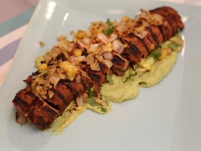 Grilled Pork Tenderloin al Pastor with Avocado Crema Recipe | Jeff Mauro | Food Network Avocado Crema Recipe, Crema Recipe, Jeff Mauro, Marinated Flank Steak, Roasted Pork Tenderloins, Avocado Crema, Grilled Pork Tenderloin, Pork Tenderloin Recipes, Stuffed Pork Tenderloin