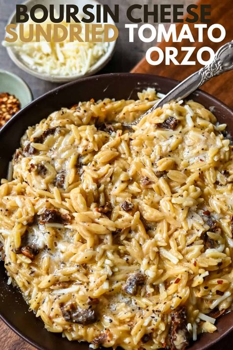 Boursin Cheese Sundried Tomato Orzo. A quick and easy one pot side dish made with orzo pasta in a creamy boursin cheese parmesan sundried tomato sauce. Orzo Pasta Casserole, Orzo Recipes With Sundried Tomatoes, Boursin And Sun Dried Tomato Orzo Bake, Boisin Cheese Orzo, Orzo Pasta Sundried Tomatoes, Orzo With Sundried Tomatoes And Spinach, Orzo Sun Dried Tomato Boursin, Creamy Sundried Tomato Orzo, Orzo Recipes With Boursin