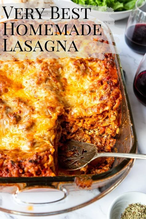 The BEST Homemade Lasagna recipe you will make that your family will request again and again. Delicious layers of lasagna noodles, rich Italian sausage tomato sauce, herby ricotta and melty cheese bake up perfectly together. It is a great family dinner for any occasion. Bonus, it can be made ahead and even frozen for easy dinner prep! Lasagna Recipe With Ricotta Oven Ready Noodles, Polish Lasagna, Mock Lasagna Recipe, Lazy Lasagne, Lasagna Sauce Recipe, Best Damn Lasagna, Entertaining Food Dinner, Easy Dinner Prep, Sausage Tomato Sauce