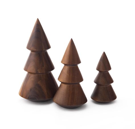 PRICES MAY VARY. Elevate your holiday décor with the Nambe Wooden Tree Trio, a set of three beautifully crafted mini Christmas trees figurines designed by Alvaro Uribe. These modern renditions of a seasonal classic are meticulously sculpted from high-quality Acacia Wood. The set includes three sizes, with measurements of Large: 10”H x 5”D, Medium: 8”H x 4”D, and Small: 6”H x 3.25”D, providing versatility in placement and arrangement. Whether adorning your mantle or gracing an end table, these tr Red Tablecloth, Traditional Holiday Decor, Green Napkins, Unique Christmas Decorations, Wood Christmas Tree, Wooden Tree, Wooden Christmas Trees, Red Candles, Wood Tree