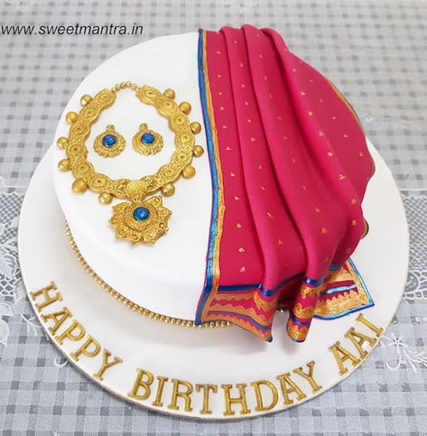 Maharashtrian Pathani saree and Indian jewellery theme cake by Sweet Mantra - Customized 3D cakes Designer Wedding/Engagement cakes in Pune - http://cakesdecor.com/cakes/332037-maharashtrian-pathani-saree-and-indian-jewellery-theme-cake Paithani Cake Design, Pathani Saree, Saree Cake, Marriage Cake, Customised Cakes, Indian Cake, Makeup Cake, 14th Birthday Cakes, Guitar Cake