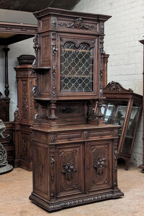 Description of item for sale: This beautiful buffet is from France and dates to the late 1800's or early 1900's.  It is Black Forest/Hunt style with lovely floral patterns.  It's made from oak finished to a medium/dark color.  This cabinet is in very good antique condition with only very minor nicks and scratches typical of 100+ years of gentle use.  The original stained/leaded glass is also undamaged.  As we do with all of our furniture, we finished it with a coat of antique grade paste wax that will maintain its beauty for years to come.  Dimensions: 96" high, 43.5" wide and 21" deep (front to back).  (DLT-0020) We welcome Local Inspections and Pickups: If you live in the area, you're welcome to come by to check out items we're auctioning and to pick up your purchases with no shipping or Dark Vintage Furniture, Antique House Aesthetic, 1800 Furniture, Dark Academia Furniture, 18th Century Decor, Antique House Interior, 1800s Bedroom, 1900 Furniture, 1900s Decor