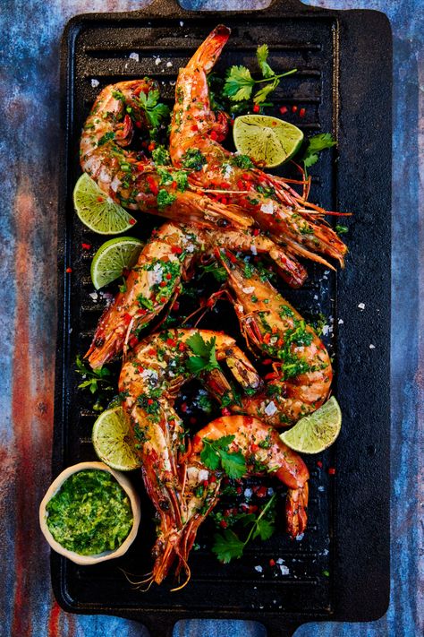 These tiger prawns are tossed in a fiery, zesty sauce before being grilled on the barbeque. Serve with a fresh wedge of lime for a burst of citrus. Tiger Prawn Recipe, Bbq Prawns, Coriander Recipes, Tiger Prawns, Bbq Fish, Prawn Dishes, Grilled Seafood Recipes, Grilled Prawns, Zesty Sauce