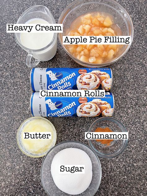 Enjoy a simple and delicious Apple Cinnamon Roll Bake made with pre-made cinnamon roll dough and apple pie filling, perfect for a cozy breakfast or dessert. Canned Cinnamon Rolls With Apple Pie Filling, Cinnamon Rolls Apples Bake, Apple Pie Croissant Rolls, Cinnamon Buns And Apple Pie Filling, Cinnamon Roll Pie Filling Dessert, Cinnamon Rolls With Pie Filling, Apple Pie Filling Cinnamon Rolls Pillsbury, Crescent Rolls Apple Pie Filling, Cinnamon Roll Deserts